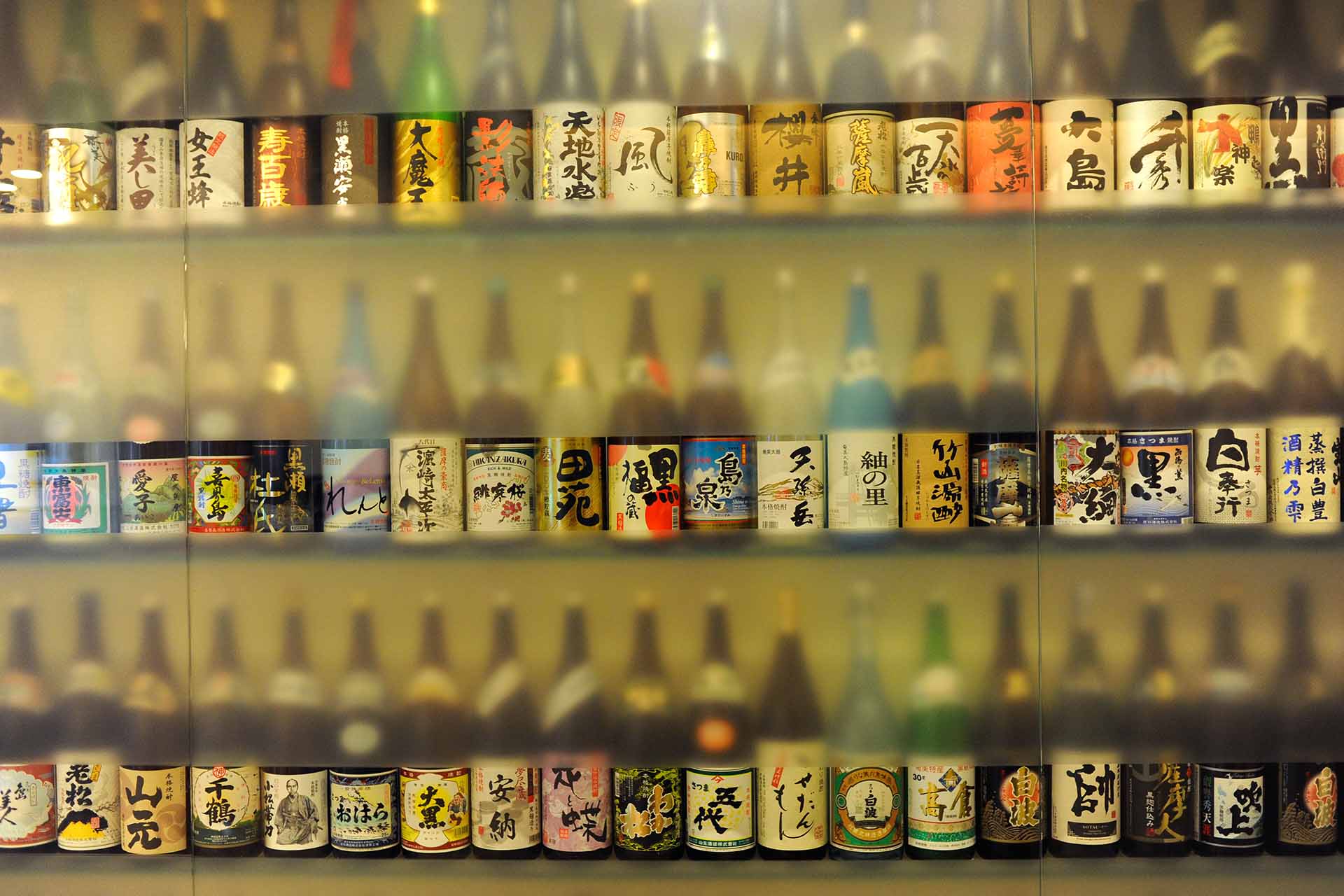 Shochu Bottles in Kagoshima, Japan / Alamy